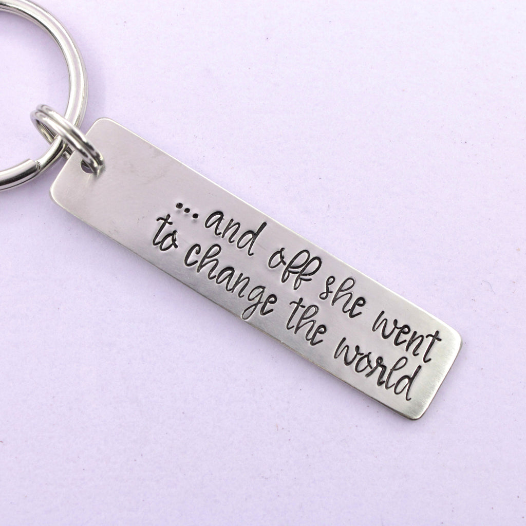 "and off she went to change the world" Hand Stamped Keychain