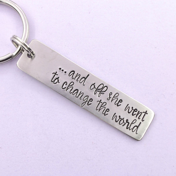 "and off she went to change the world" Hand Stamped Keychain