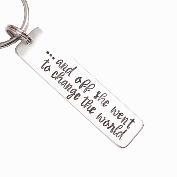 "...and off she went to change the world" Hand Stamped Keychain