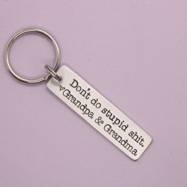 "Don't do stupid shit.  Love, Mom" (or Dad, Auntie, Grandma, etc) Hand Stamped Keychain