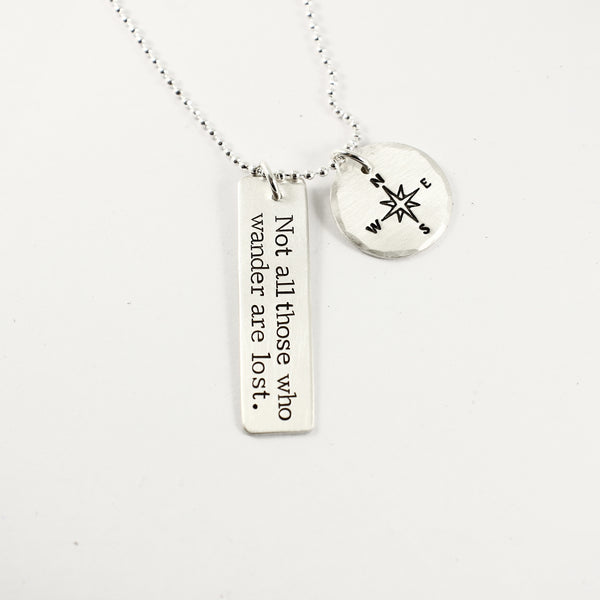 "Not all those who wander are lost" - sterling silver charm necklace with compass charm - Completely Hammered