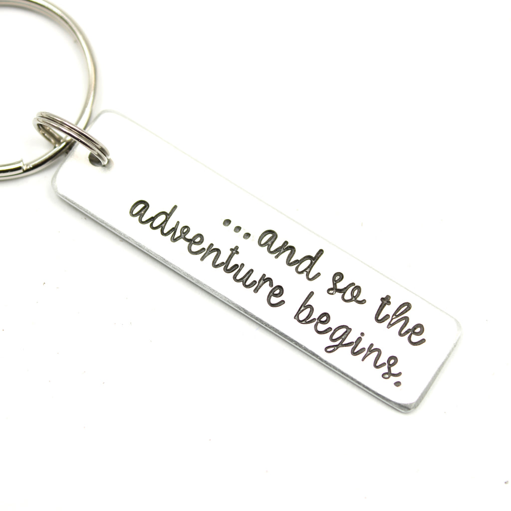 "And so the adventure begins" Hand Stamped Keychain
