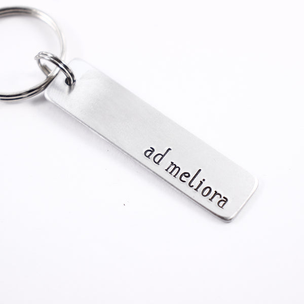 "ad meliora" (toward better things) Hand Stamped Keychain