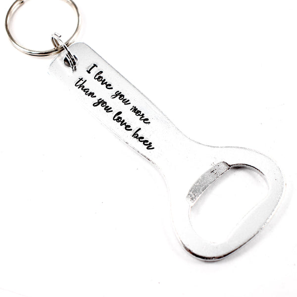 "I love you more than you love beer."  Bottle Opener Keychain