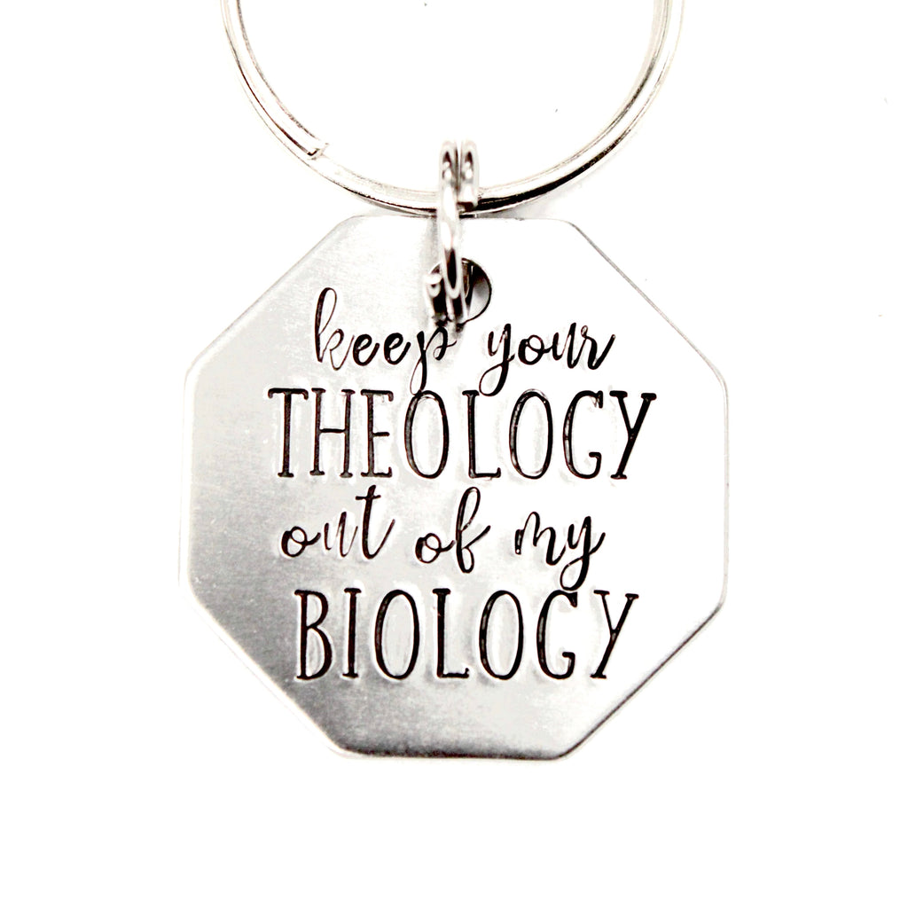 "Keep your theology out of my biology" Stainless Steel keychain.