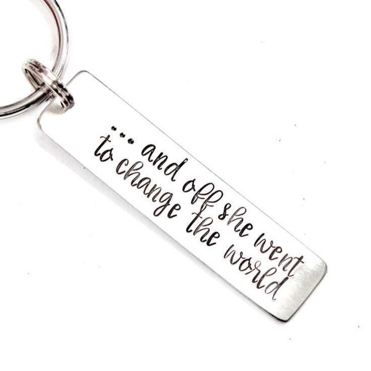 "and off she went to change the world" Hand Stamped Keychain