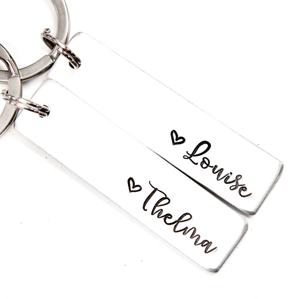 "Thelma" and "Louise" Keychain Set