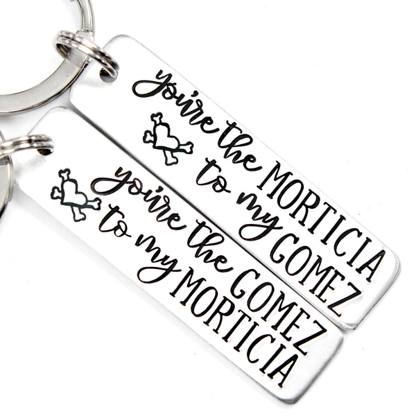 "You're the GOMEZ to my MORTICIA" and "You're the MORTICIA to my GOMEZ" Keychains