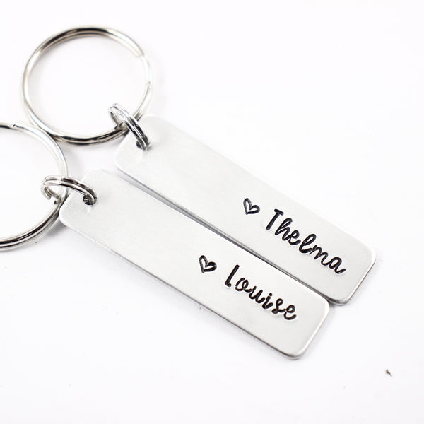 "Thelma" and "Louise" Keychain Set