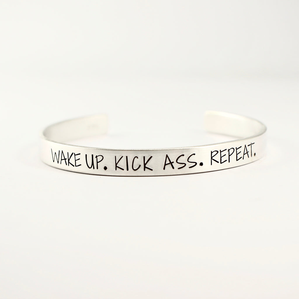 "WAKE UP.  KICK ASS. REPEAT." Cuff Bracelet - Completely Hammered