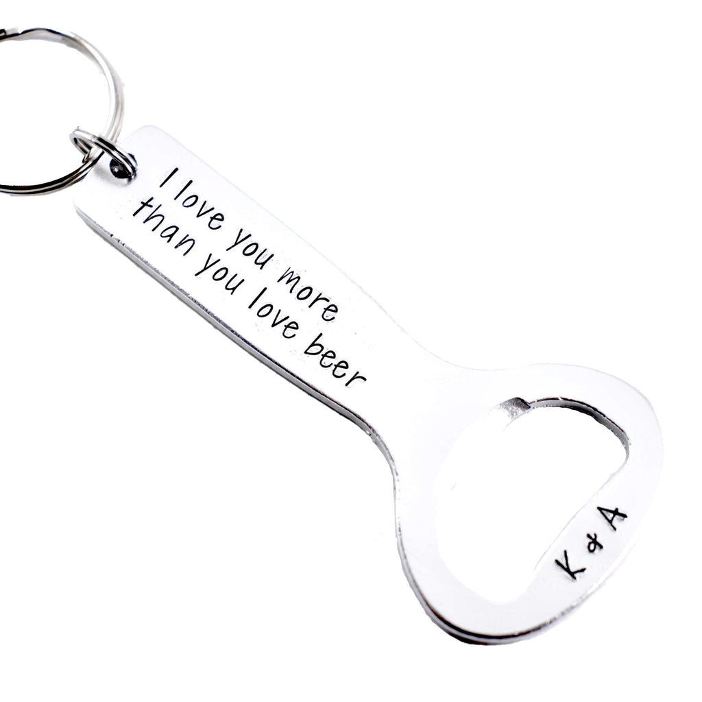 "I love you more than you love beer."  Bottle Opener Keychain