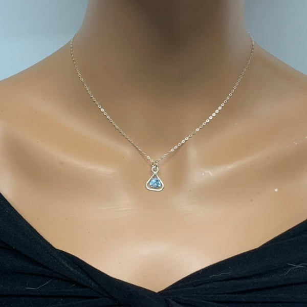 Sterling silver and Princess Cut Blue Topaz Pendant