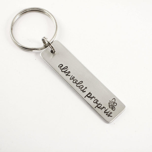 "Alis volat propriis" - She flies with her own wings - Hand Stamped Keychain - Completely Hammered