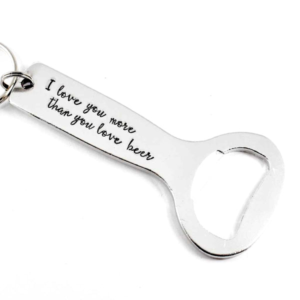 "I love you more than you love beer."  Bottle Opener Keychain