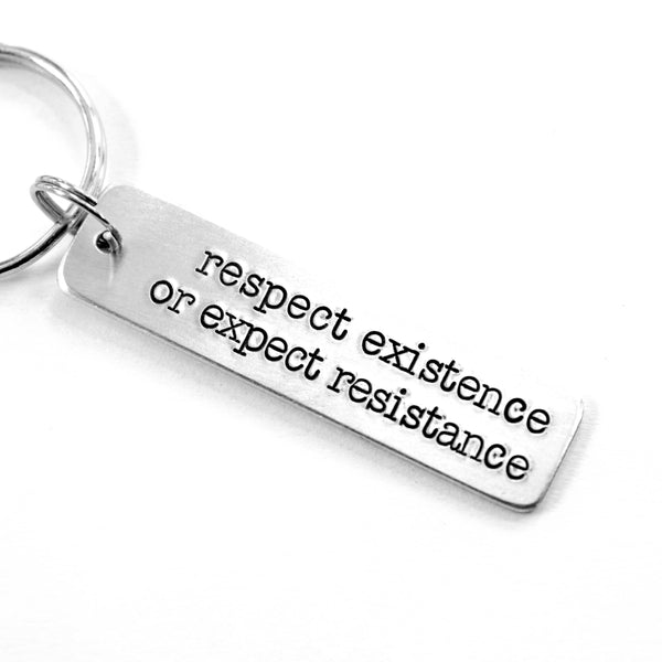 "Respect existence or expect resistance"  Hand Stamped Keychain