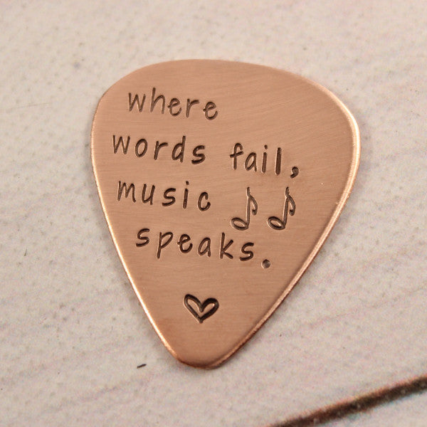 "Where words fail, music speaks" Guitar Pick - Available in stainless steel, brass, and copper - Completely Hammered