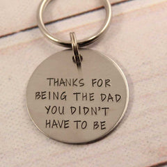 "Thanks for being the dad you didn't have to be" Stainless Steel keychain.