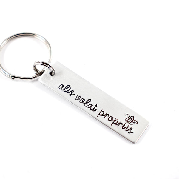 "Alis volat propriis" - She flies with her own wings - Hand Stamped Keychain