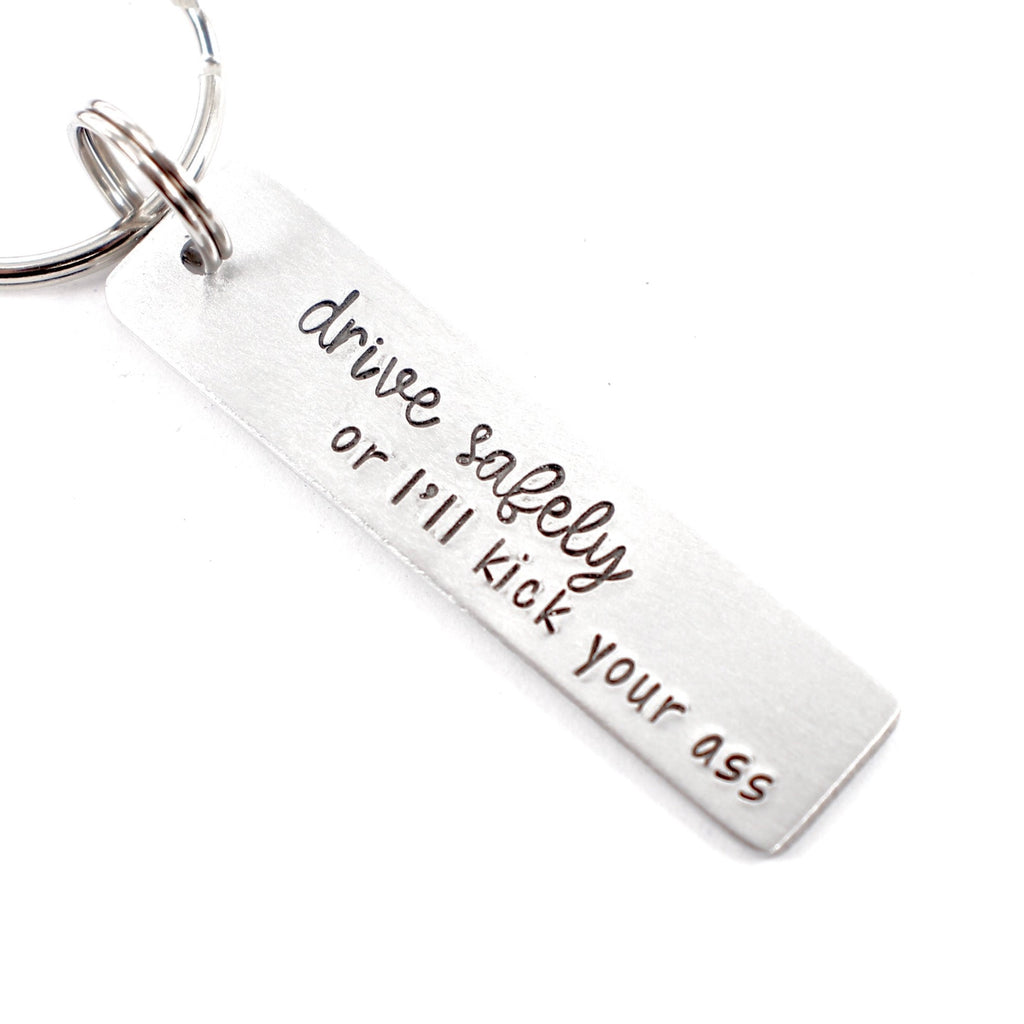 "Drive safely or I'll kick your ass" Hand Stamped Keychain