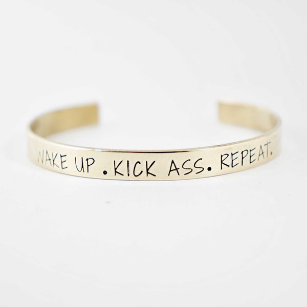 "WAKE UP.  KICK ASS. REPEAT." Cuff Bracelet - Completely Hammered