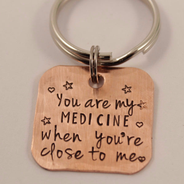 "You are my medicine when you're close to me" copper keychain - Completely Hammered