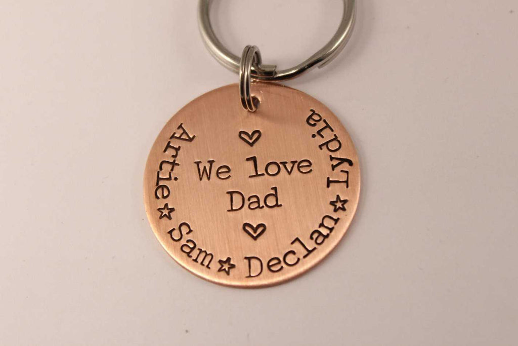 "We Love Dad" - Hand stamped, personalized copper keychain. - Completely Hammered